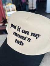 Put It On My Mom’s Tab Trucker Hat