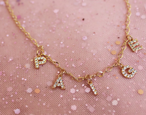 Custom star top crossed lovers necklace